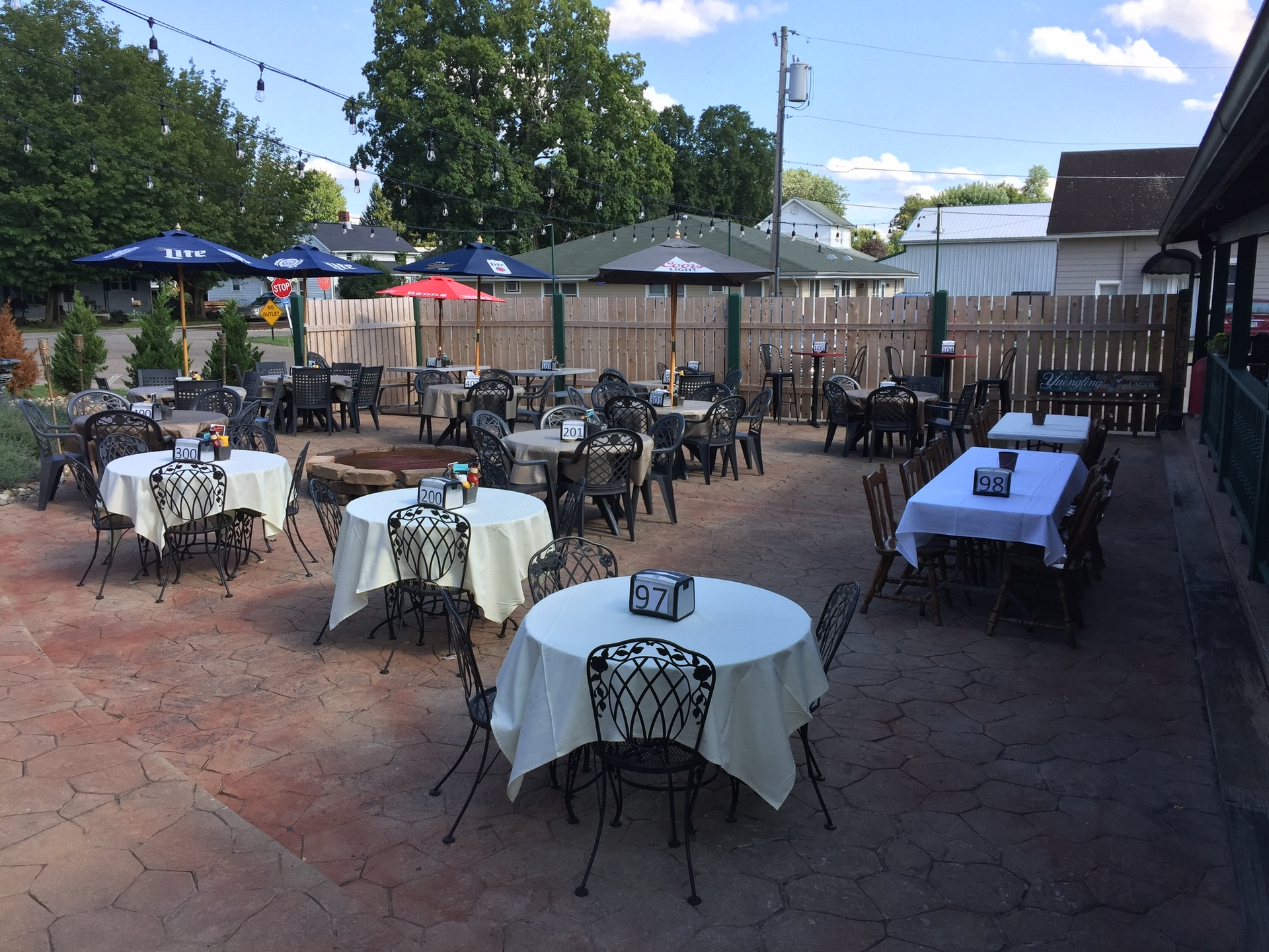 Enjoy Food and Drinks on our beautifully lit patio dining area.